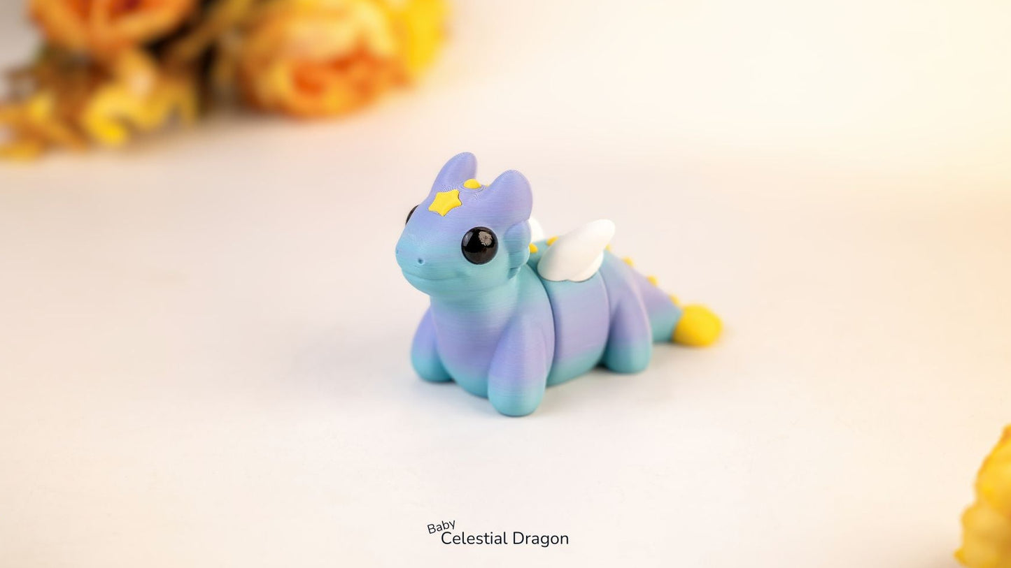 Blue dragon figurine with yellow accents on a light background