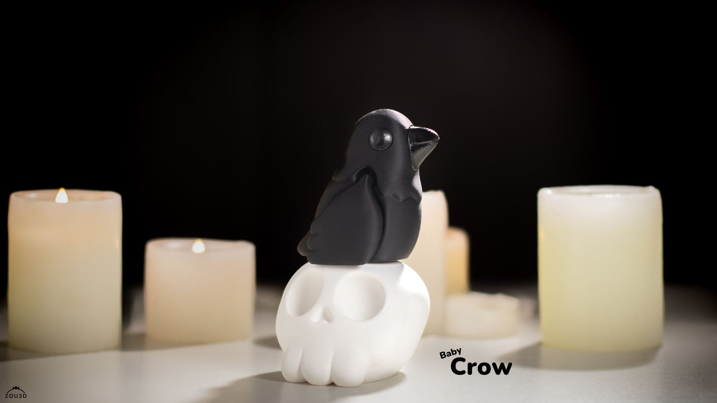 Black crow figurine on a white pedestal with candles in the background
