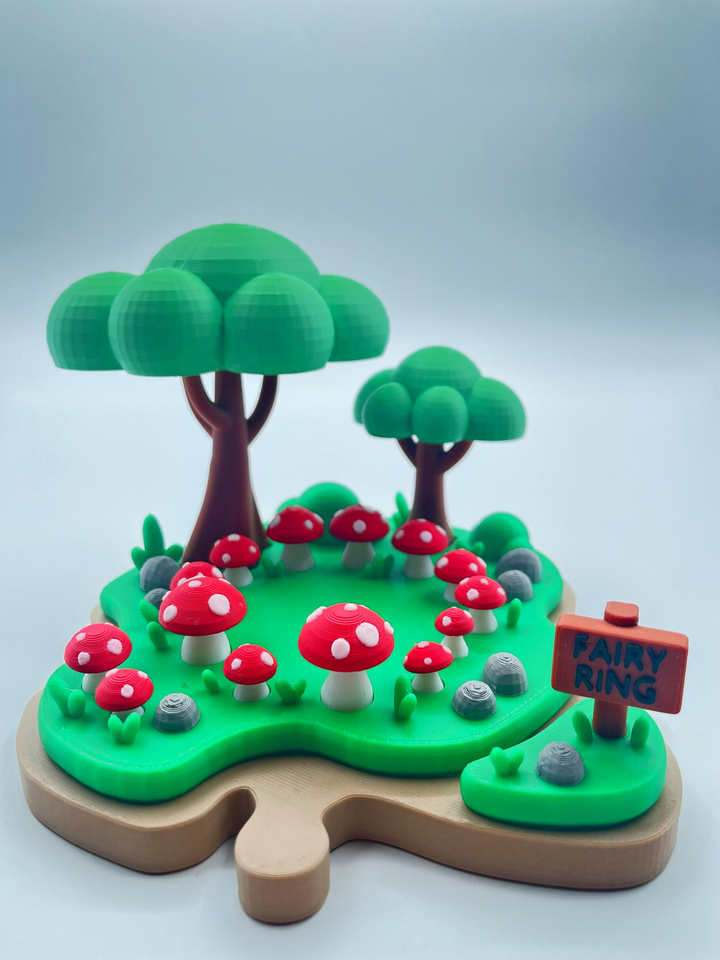 Toy fairy ring with mushrooms and trees on a white background