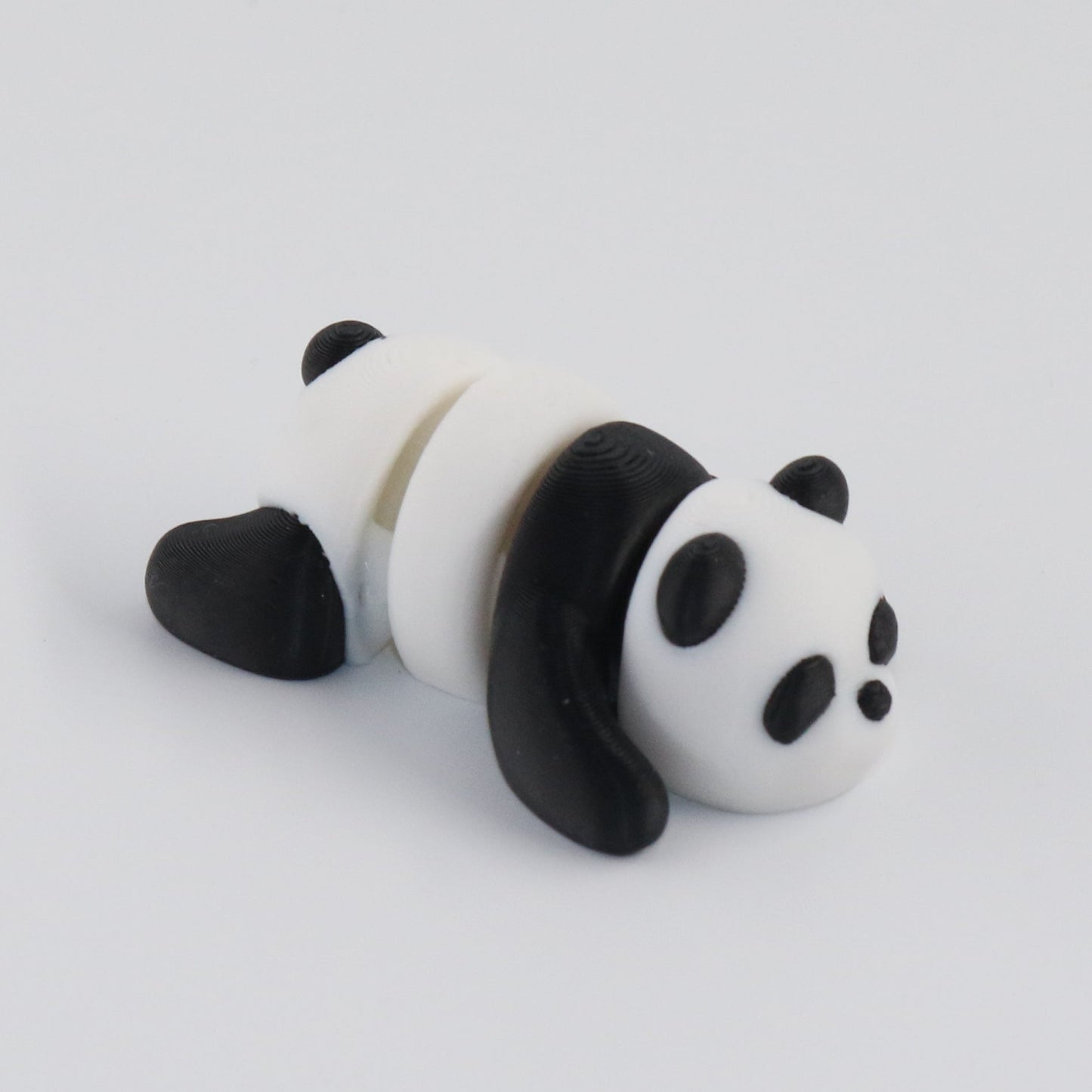 Panda-shaped object on a white background