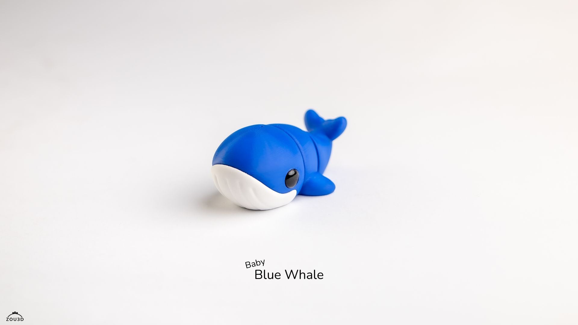 Blue whale toy on a white background