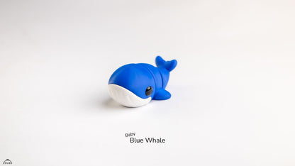 Blue whale toy on a white background