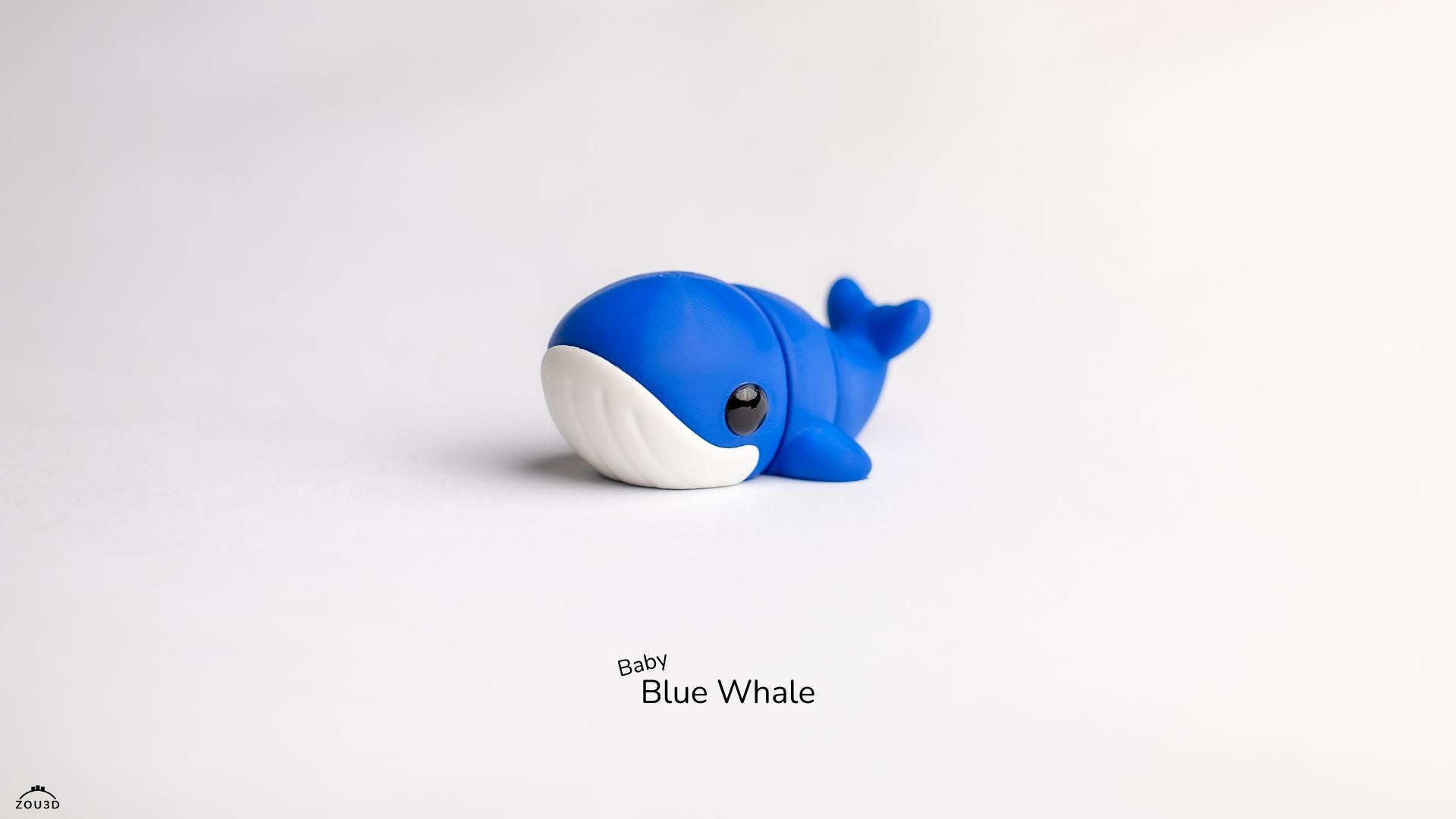 Blue whale toy on a white background with 'Baby Blue Whale' text.
