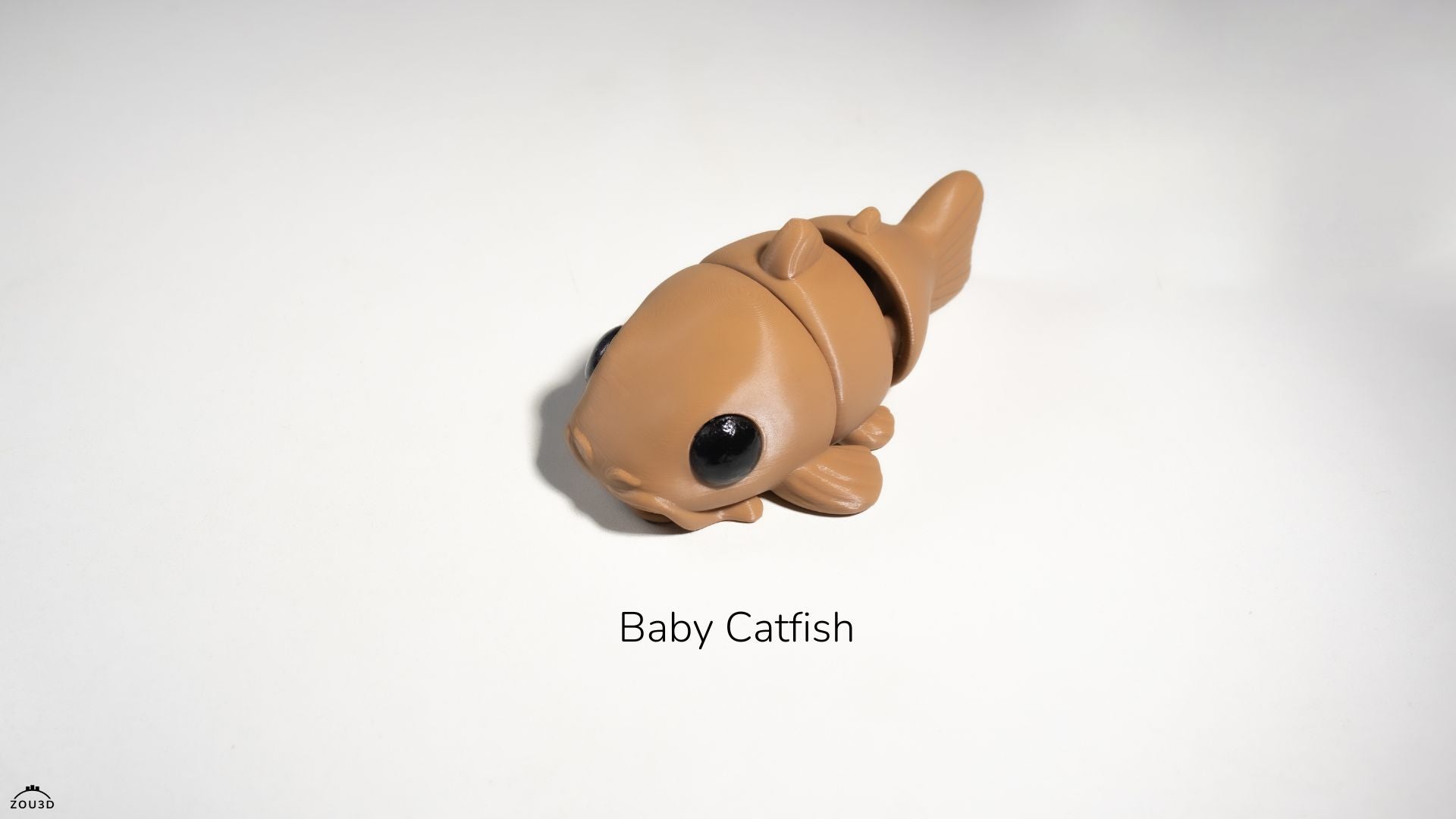 Toy catfish on a white background with 'Baby Catfish' text.