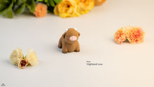 Tiny Highland Cow