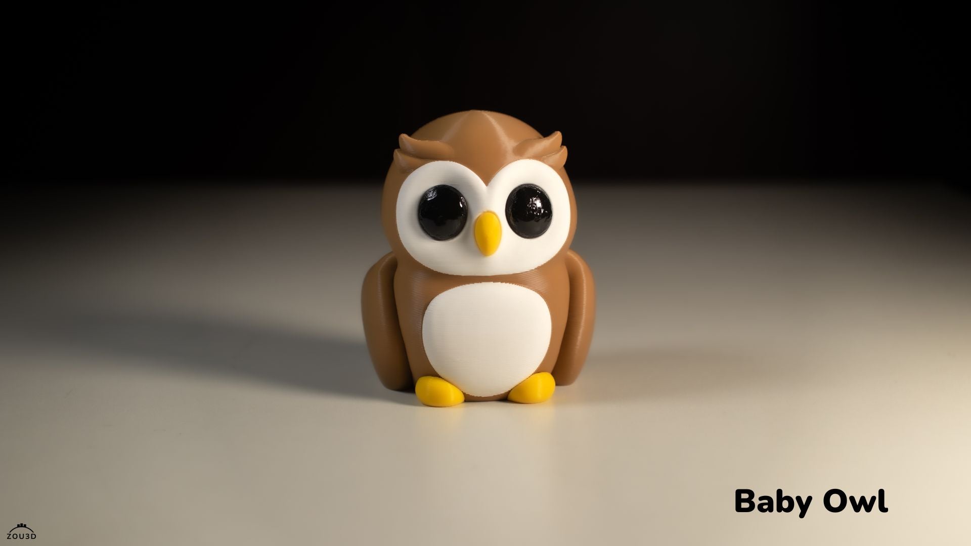 Toy owl figurine on a neutral background with 'Baby Owl' text