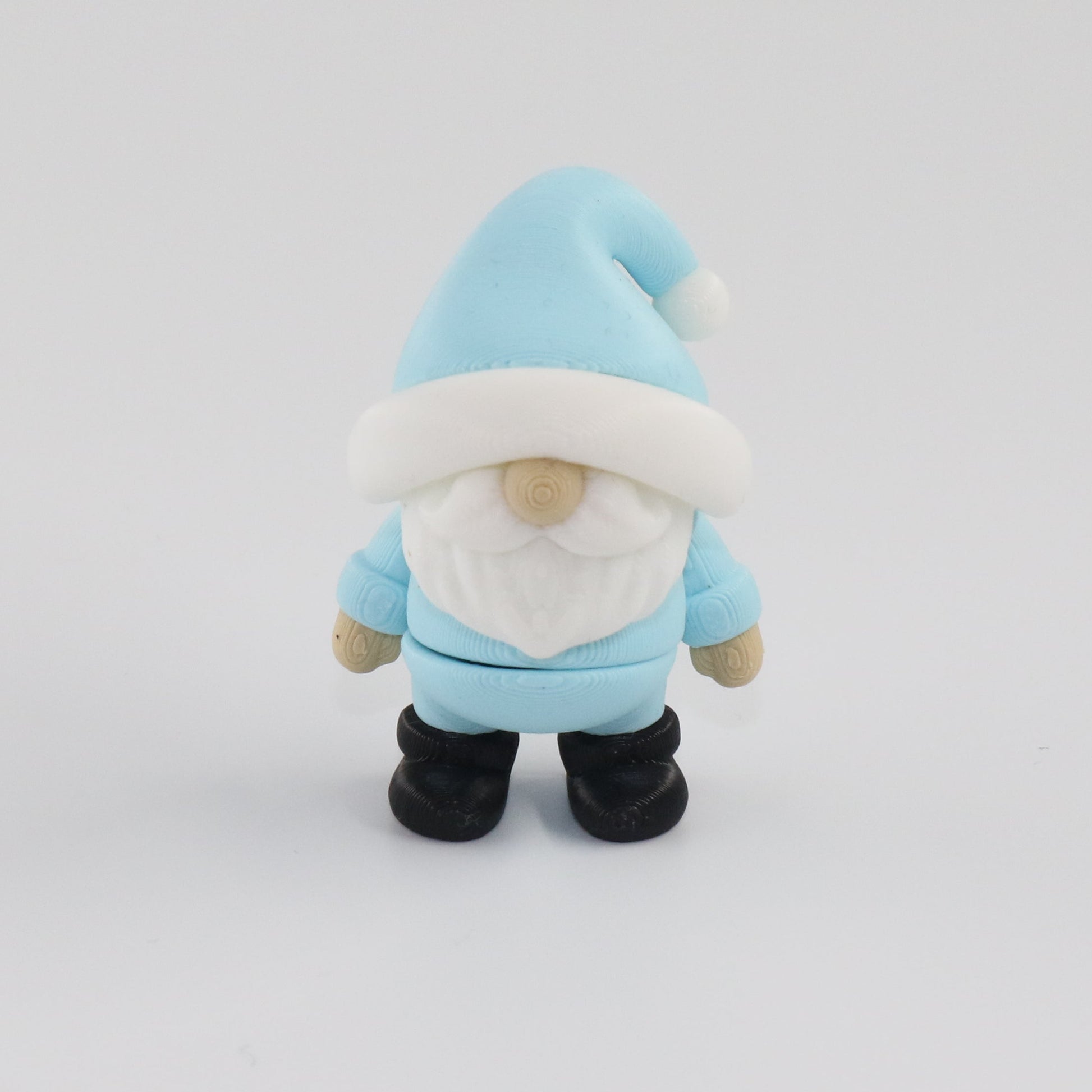 Blue Gnome with a white beard on a white background
