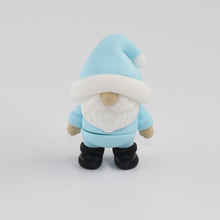 Blue Gnome with a white beard on a white background