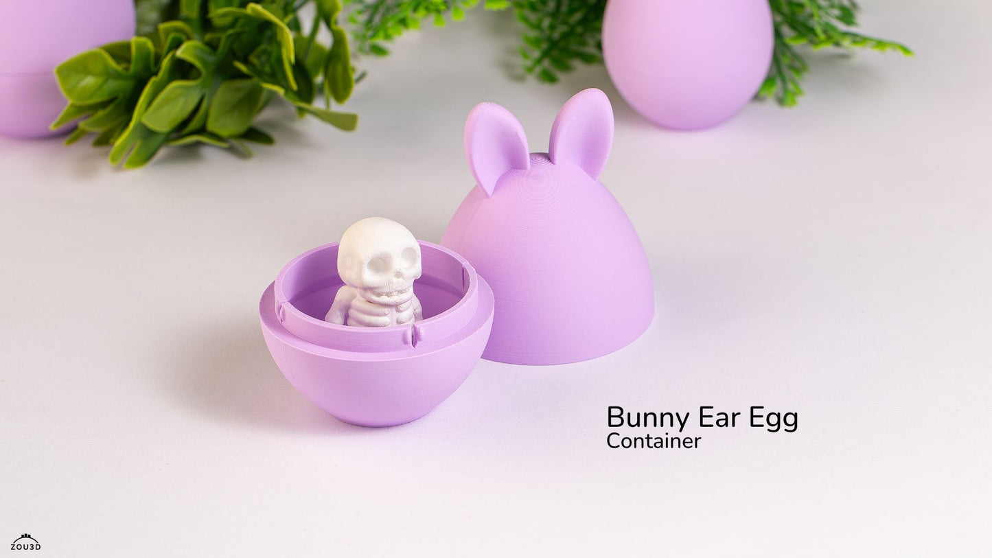 Purple bunny ear egg container with a small skeleton figure inside, on a light background.