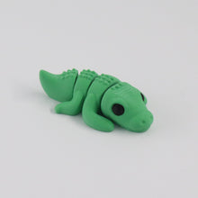 Green crocodile on a white background