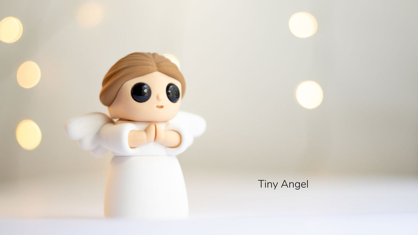 Small angel figurine with a blurred light background