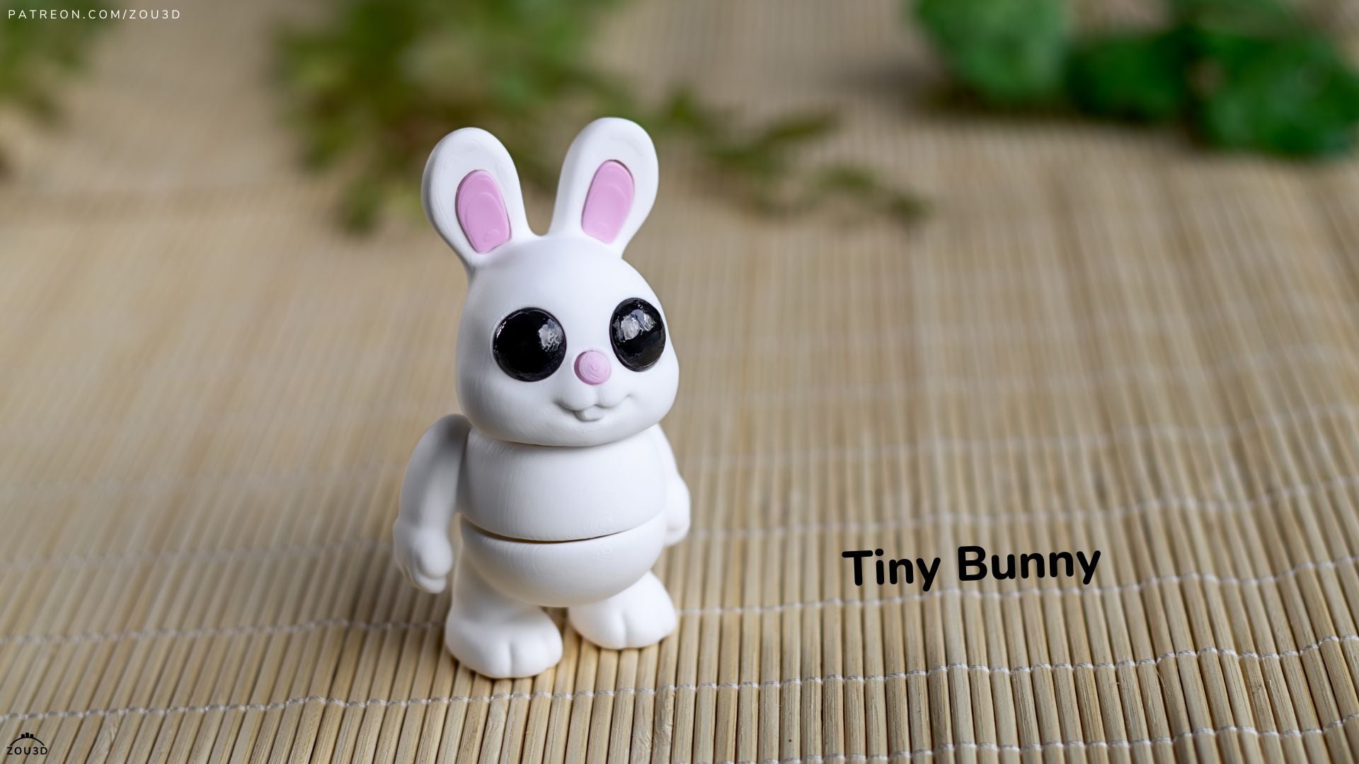 White bunny figurine with pink ears on a woven mat background