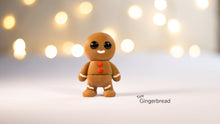 Small gingerbread figurine with a blurred light background