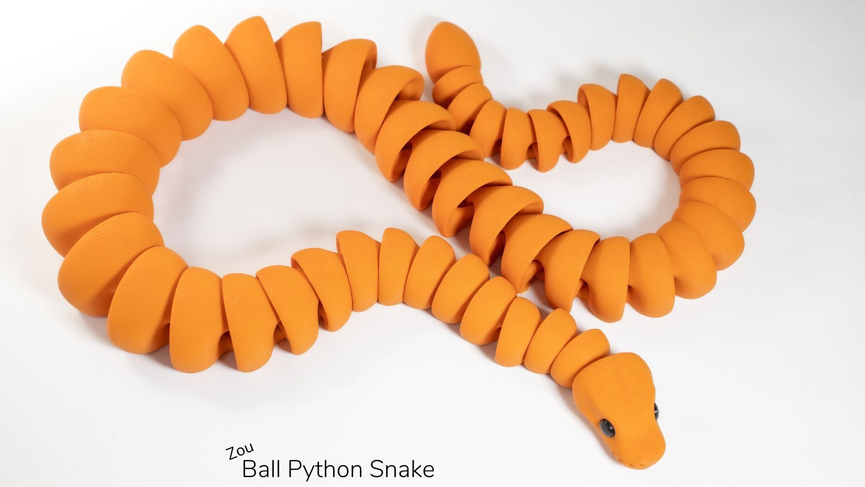 Orange snake model on a white background