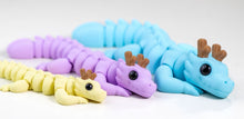 Three colorful mini dragons on a white background with 'Mini Dragon' text.